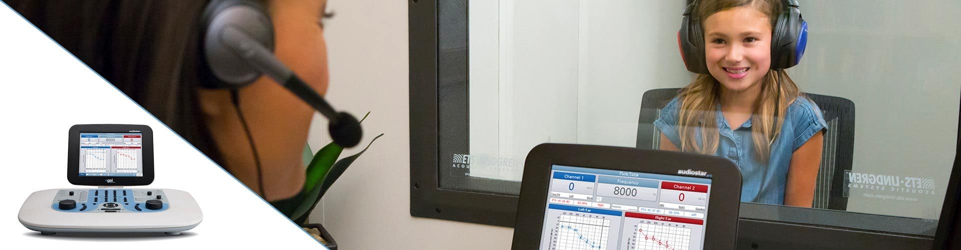 Audiologist performing a hearing test on a child